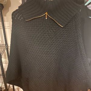 Poncho with gold zip